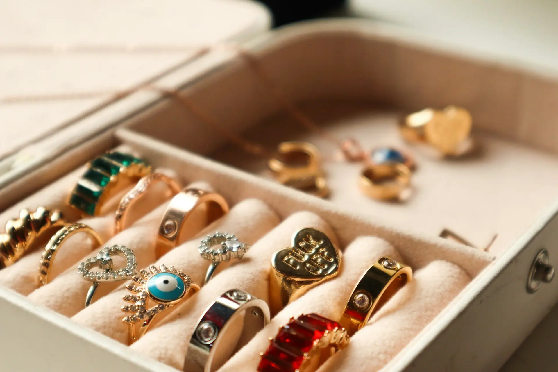 a box filled with lots of different types of rings